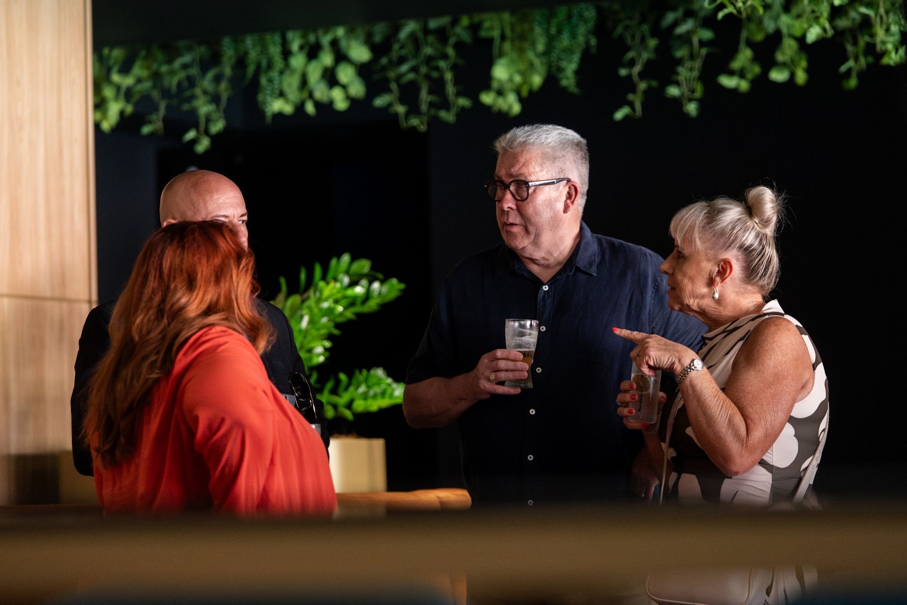 Guests chatting in a lounge